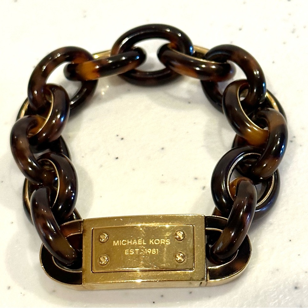 Michael Kors Bracelet.  Tortoise ID style in gold tone.